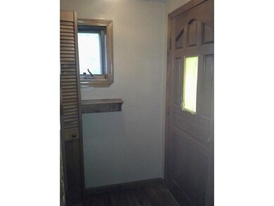 Entry. Full closet and hooks in entry