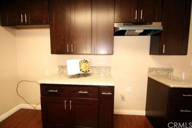 With new cabinets & gorgeous granite countertops