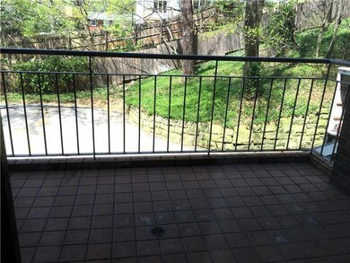 Patio/Deck. covered porch with tile floor and priv