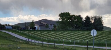 Hay fields below house