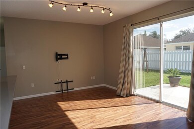 Light filled living room with solar tinting on sli