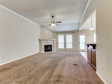 Open living room with gas fireplace