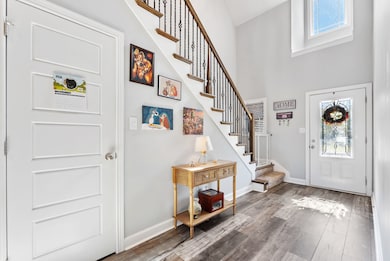 Entry way with vaulted ceilings and large window overlooking the walkway.  561 Tacoma Dr Clarksville TN 37043