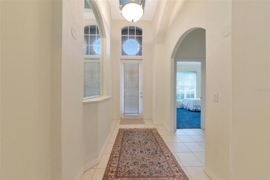 Grand foyer with volume ceilings and art niches