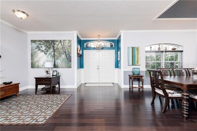 Foyer into the living room/dining room. Hardwood f