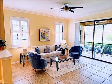 Living room featuring light patterned tile floors,