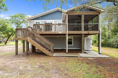 219 NE 49th St, Oak Island, NC 28465 - photo 2