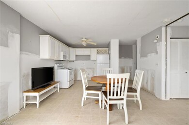 Tiled dining area with ceiling fan