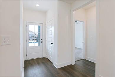 Front Entry Foyer - coat closet and leading into O