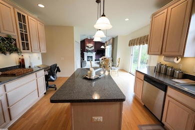 Kitchen on Main Floor. Overlooks back yard and lake.