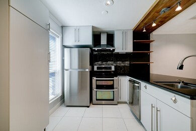 Full view of the kitchen.  Pantry is on the left t