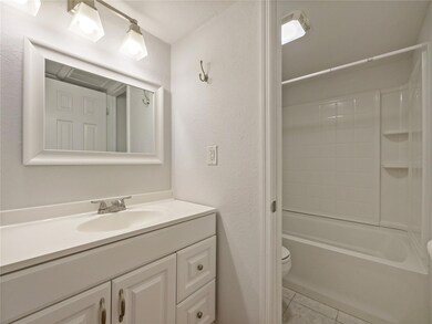 Bathroom with seperate comode and shower area