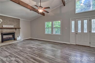 Vaulted ceiling and fireplace in great room
