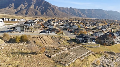 View of mountain backdrop with nearby suburban area