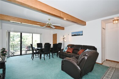 Living room/ dining room opens to the covered pati