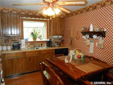 Kitchen. Eat-in with hardwood floors.