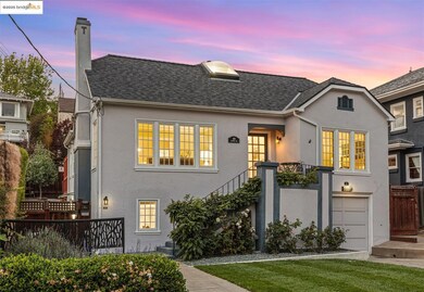 View of front of house featuring a chimney, an attached garage, stucco siding, and a shingled roof