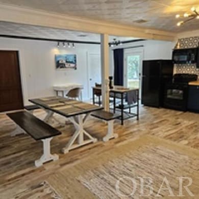 Open kitchen/dining/living area
