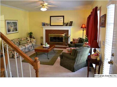 Spacious living room with tall ceilings, crown mol