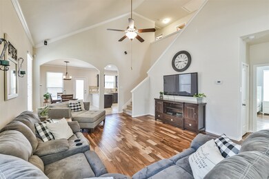 Your new living room has beautiful hard wood floors, vaulted ceilings and natural light.