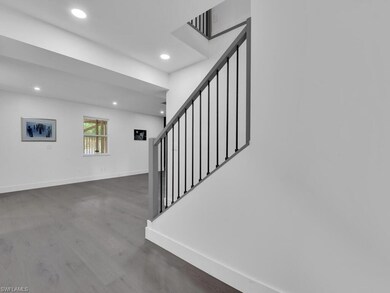 Stairs with dark wood-type flooring
