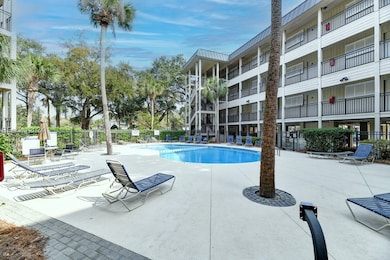 Swimming pool with a patio area