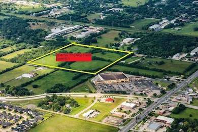 Back to Food Town. approx 800' from FM518