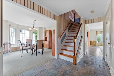 Foyer with view of dining room and into the living