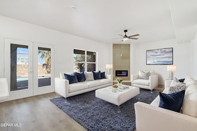 fam. living room w/ double doors outside