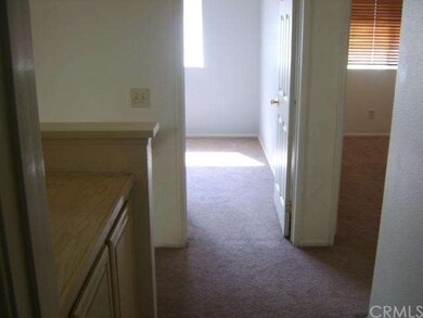 Upstairs hallway to the bedrooms and bathroom