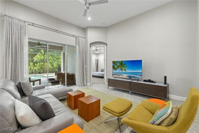 Living Room with 12FT Ceilings and 8FT High Triple