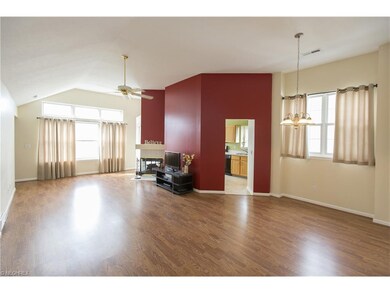 Spacious Great Room with three sided fireplace