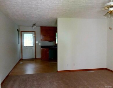 Living Room looking into the Kitchen