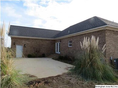 View of the back of the home. Open patio