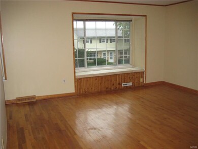 LR is highlighted by large bay window w/seating ar