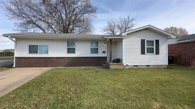 View of front of house with a front lawn