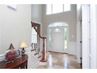 Entry/Foyer. GLEAMING TRAVERTINE FLOORS AND NATURA