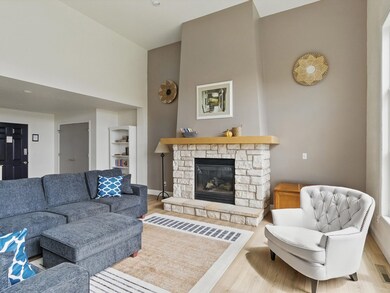Fireplace anchors the room