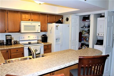 Kitchen, Laundry with Stackable Washer/Dryer and P