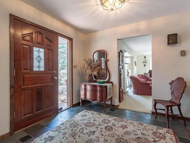 Grand entry with slate tiled floor