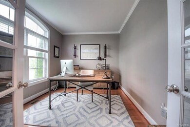 Handsome study with arched window, oak hardwood fl