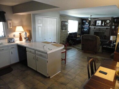 Kitchen area looking to family room