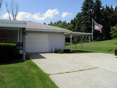 Parking Lot/Garage. Oversized garage, carport and 