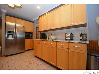 Kitchen. A new back splash and granite countertops