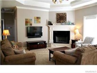 Large greatroom with boxed ceilings.