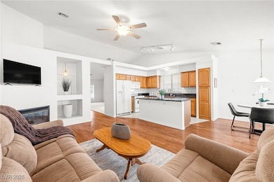 Living area featuring light wood-type flooring, a