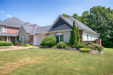 EXPANSIVE GARAGE WITH DRIVE THROUGH PORTICO