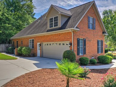 Sidewalk leads to front door & back deck