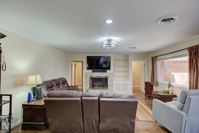 Spacious living room. Decorative modern lighting