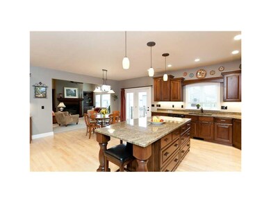 Kitchen. Kitchen has cherry cabinets, granite coou